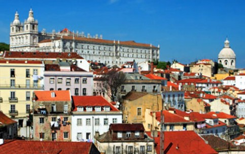 Seen from the river - one of the city's many great viewpoints - Lisbon is an impressionist picture of low-rise ochre and pastel, punctuated by church towers and domes.