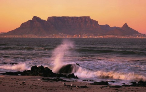 Table Mountain, a flat-topped mountain, is a prominent landmark overlooking the city of Cape Town. It is a remarkable attraction, with many tourists using the cableway or hiking to the top
