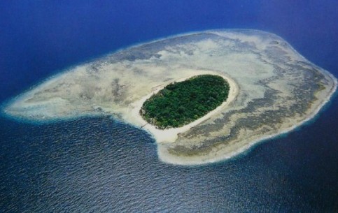 Sipadan - tiny islet only 500 metres in diameter, National Park of Malaysia. Ideal diving location: coral reefs, submarine cave.