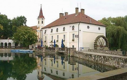 Charming health resort town of Tapolca is known first of all for its karst caves, famous speleoclinic and underground lake, where boat excursions are conducted