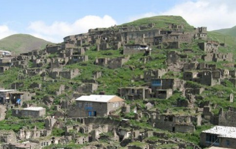 Dagestan is home for thirty-three peoples. In the mountain districts of the country villages cling along the steep slopes so that the roof of one home becomes a yard for another