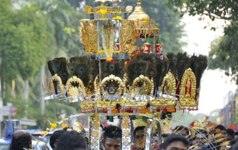 An ancient Hindy festival Thaipusam is held on a grand scale in Singapore; it is accompanied by various forms of self-inflicted wounding, which make Europeans shudder with horror